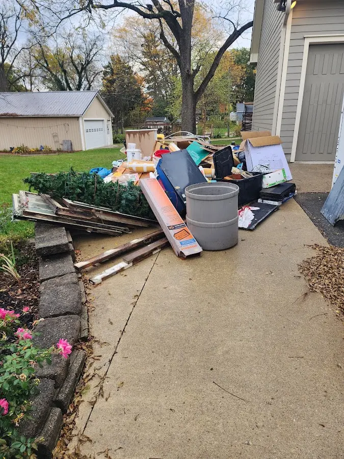 Dumpster being loaded with debris for Commercial Dumpster Rental in Westchester